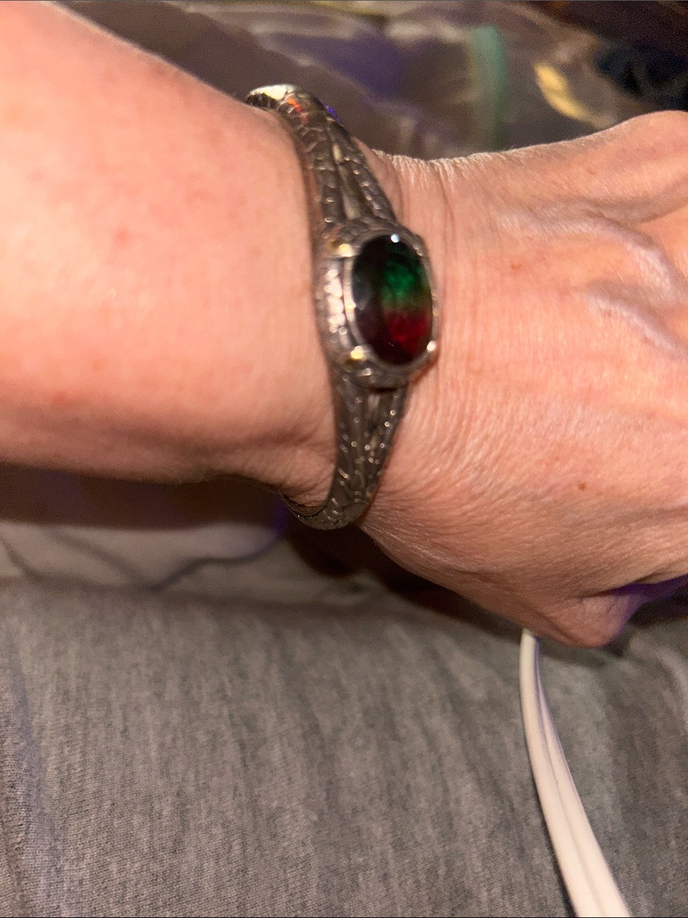Balinese sliver bracelet with rainbow quartz stone
